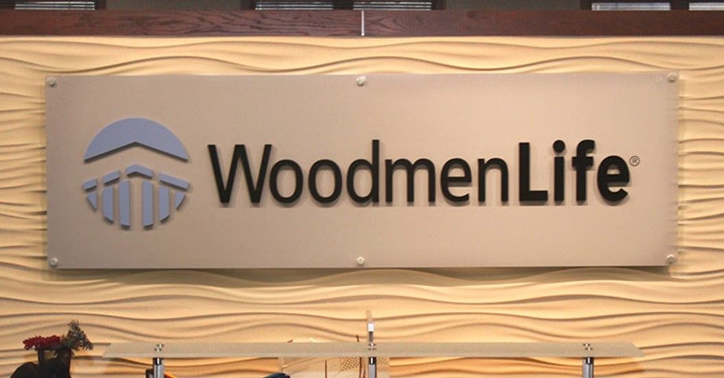 A close up picture of the home office WoodmenLife sign in the lobby